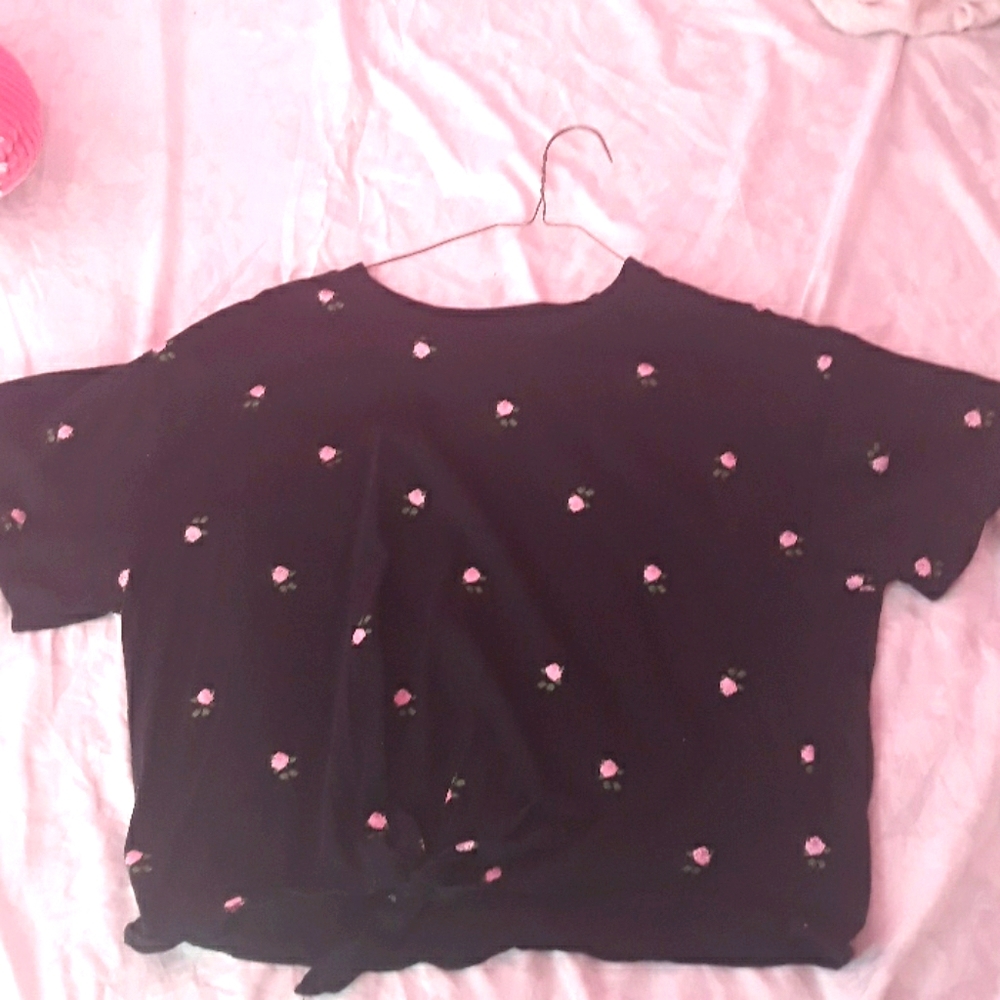 Black flower covered shirt